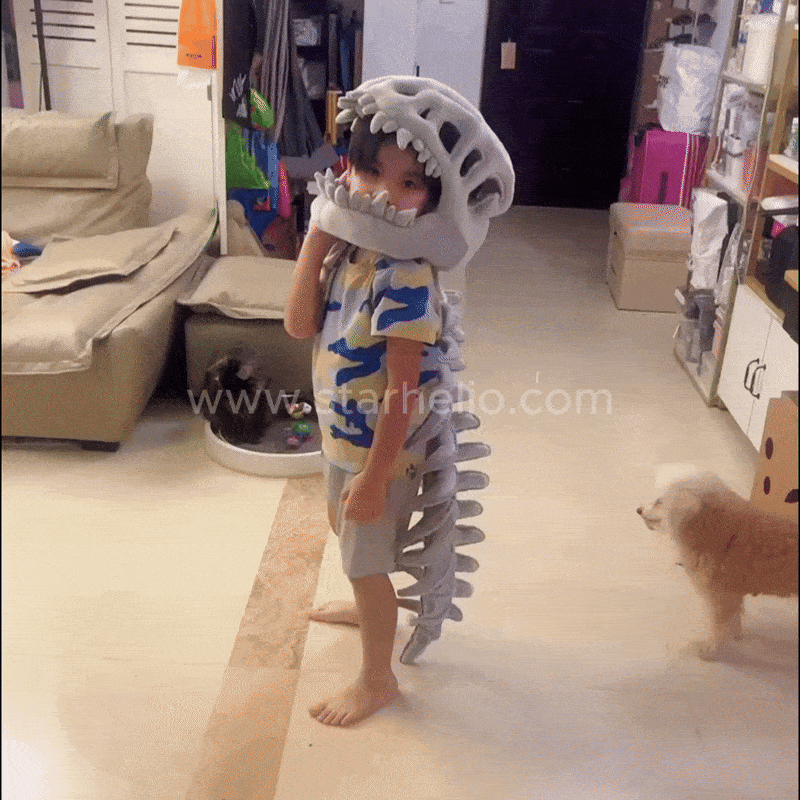 Kids and adults playing in the dino skeleton plush